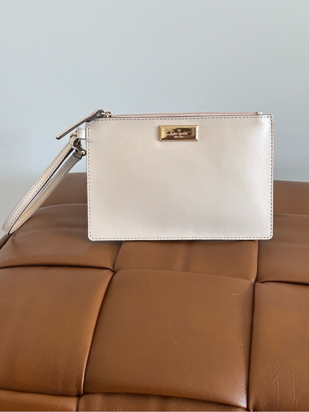 kate spade Cream Leather Wristlet with Gold Plate